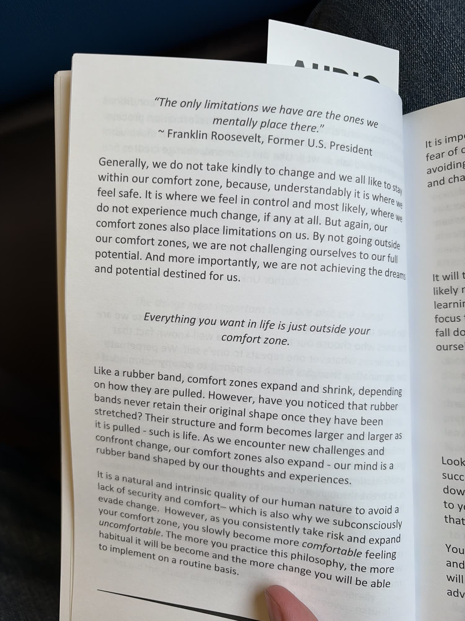 The open page of the book: a Franklin Roosevelt line about limitations, and under it the line that everything you want in life is just outside your comfort zone